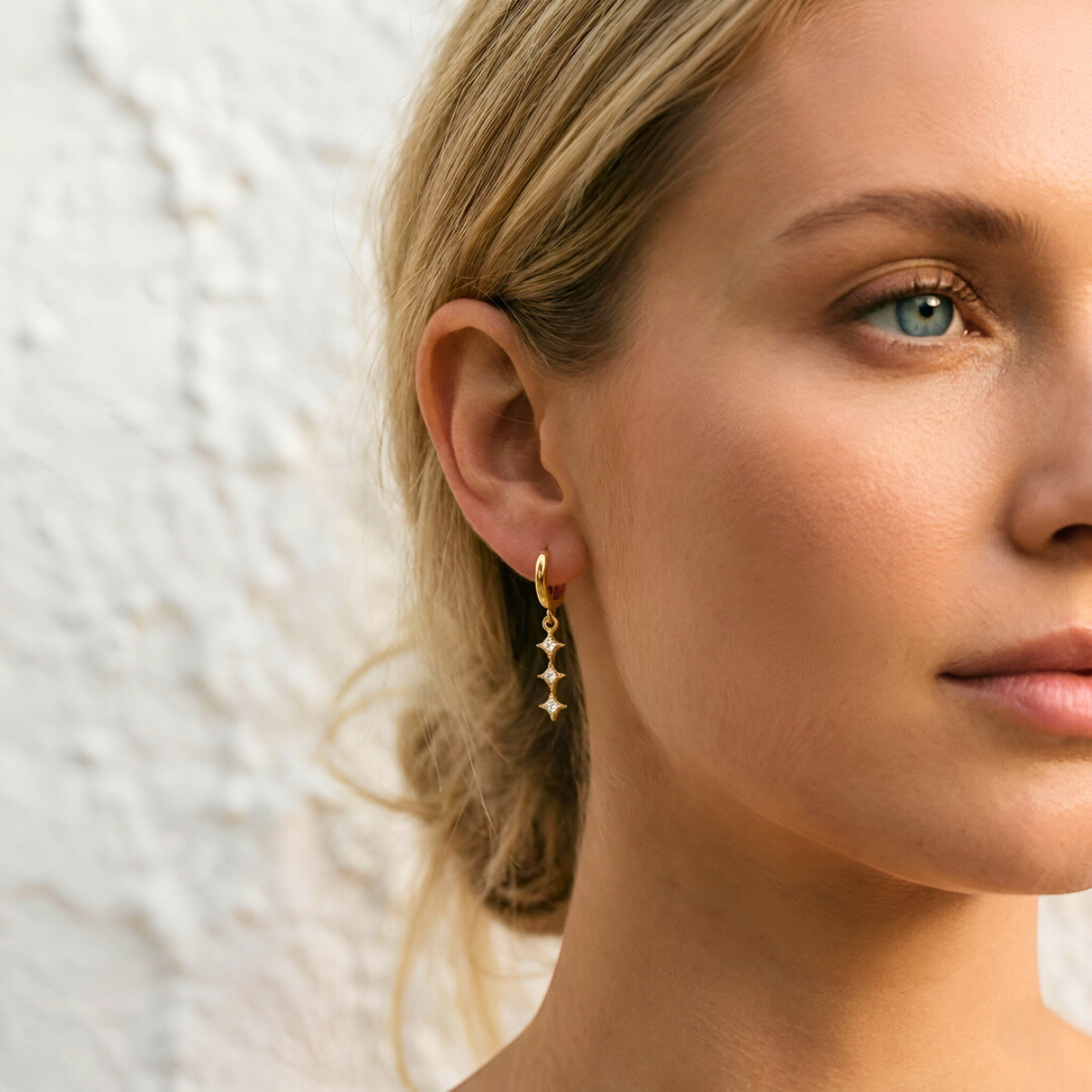 Gold Earrings with Triple Star Pendant